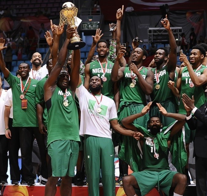 The winning Nigerian basket ball team members savouring the joy of their victory.