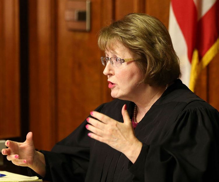 Judge Cosgrove delivering her judgment.