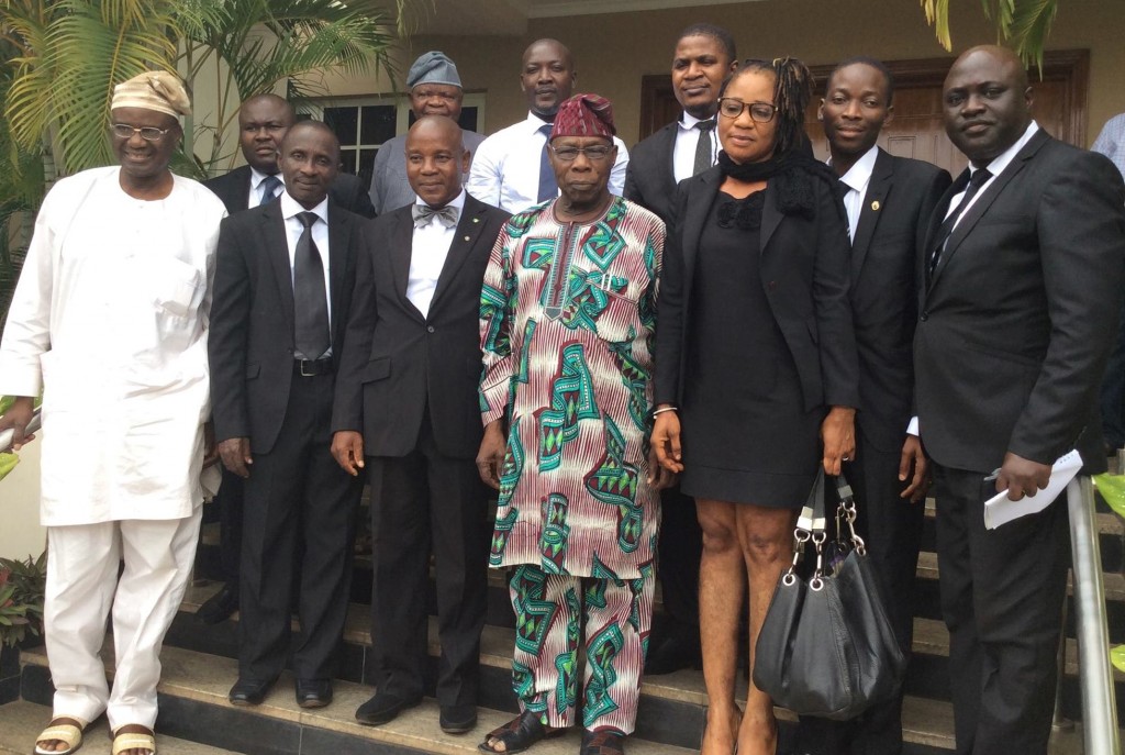 Obasanjo and others with representatives of the students in Abeokuta on Tuesday.