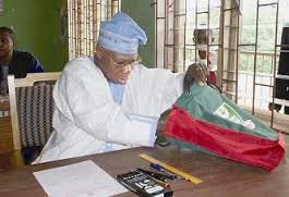 *Obasanjo getting set to write his examination at Egba High School, Abeokuta study centre of NOUN.