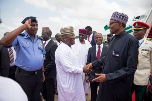 *President Buhari acknowledging greetings from dignitaries led by VP Osinbajo who welcomed him from US.