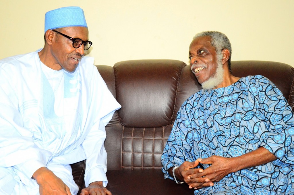 President Buhari (left) with Pa Fasanmi during a condolence visit on his wife’s death in 2014.