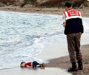 Syrian boy, Alan Kurdi body found by the beach in Turkey.