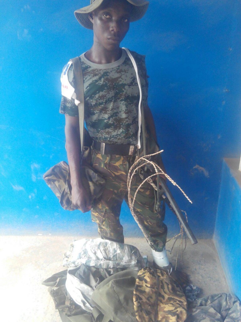 The suspect in Nigeria Army uniform.