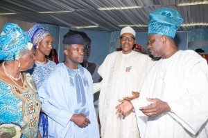 *President Buhari (middle), Vice President Yemi Osinbajo, his wife and Awo's daughter listening to Governor Ibikunle Amosun at HID's burial in Ikenne.