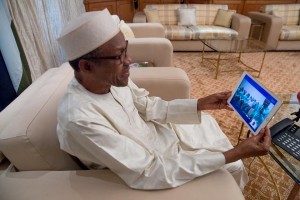 *President Muhammadu Buhari on Skype with the Golden Eaglets and their coach.