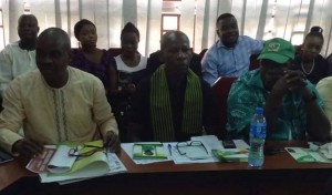 *The three chairmanship aspirants: from left are Ewuoso, Ogunyinka and Shokunbi, during the manifesto night.  Behind them are members of the union.