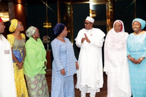 *President Buhari with the leaders of the women in politics.