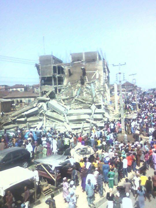 Sympathisers at the collapsed building site.