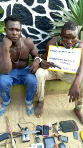 Okedele and Adeboye after their arrest.