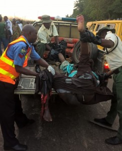 *TRACE officials taking away the corpses of the victims.