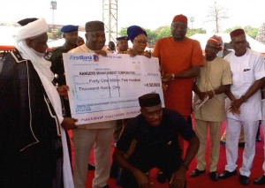 *L-R: Sultan, Ugwuanyi, Deputy Governor, Mrs. Cecilia Ezeilo, Speaker, House of Assembly, Hon. Edward Ubosi, Sports Commissioner, Mr. Charles Ndukwe, Assembly Chairman on Sports, Hon. Nelson Uduji and Captain of Rangers, Mr. Okey Odita at the presentation.