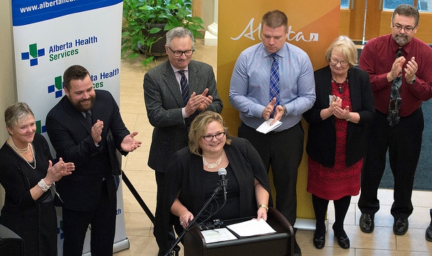 Hoffman making the announcement on the enhanced health care services.