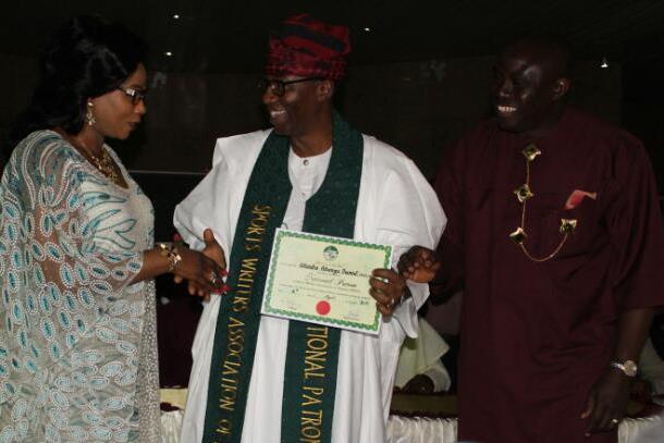 Yeye Olufunke Daniel (left) congratulating her husband, Otunba Daniel after his investituture. With them in Sirajo.