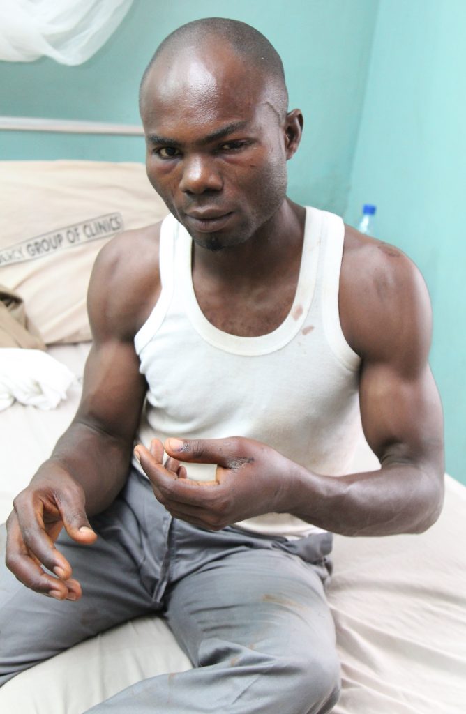 Faleti on hospital bed receiving treatment.