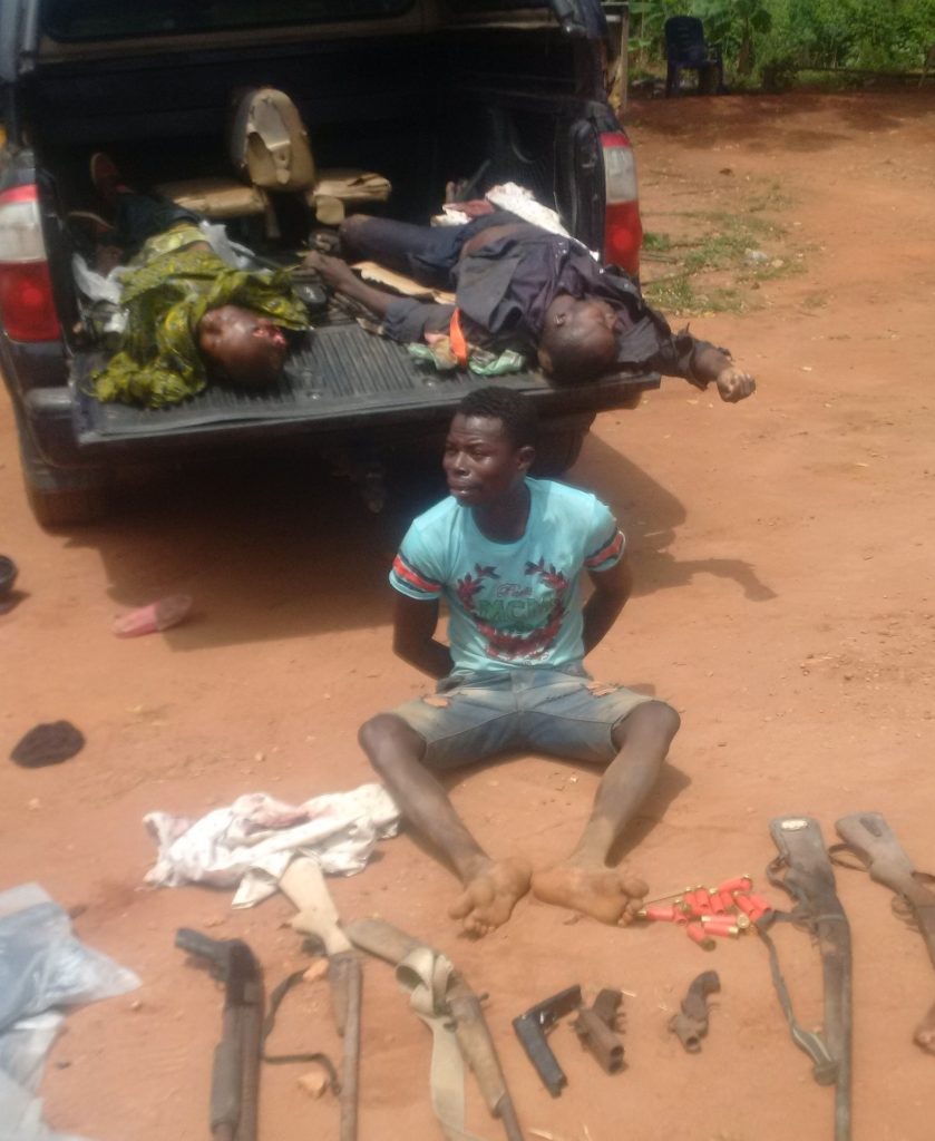 The arrested robber and his dead colleagues.